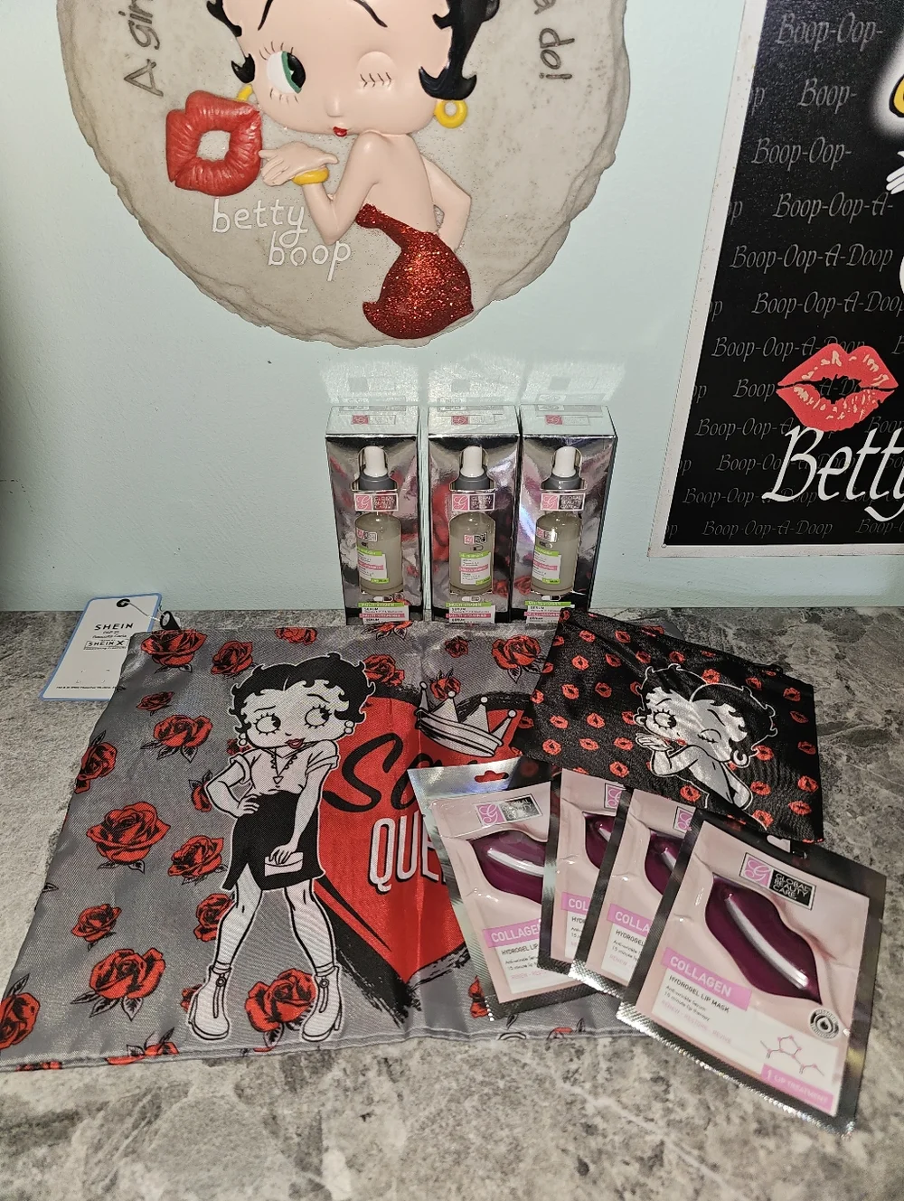 9pc Betty Boop Sassy Queen Tote, Cosmetic Pouch, 3 Serums & 4 Lip Masks!